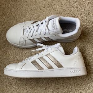 Adidas ladies 8.5. White/gold stripes